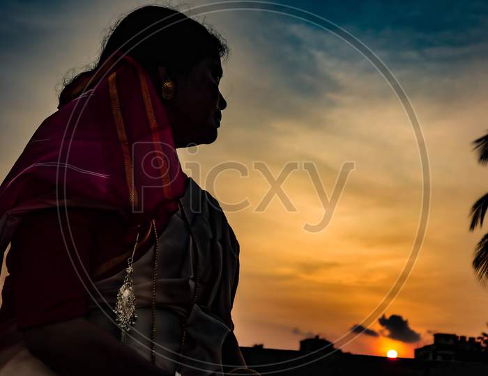 Sunset with an Indian woman