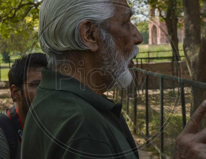 A Side Portrait Of Very Old Indian Man.