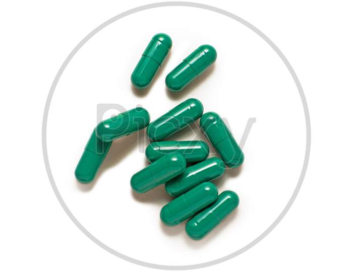 Green Capsule Pills Isolated On White Background