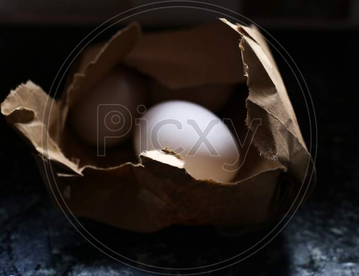 White Colour Chicken Eggs In A Brown Cover