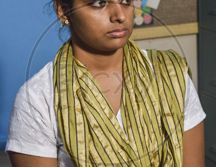 A Indian Girl Poses For Portfolio Shoot At Studio.