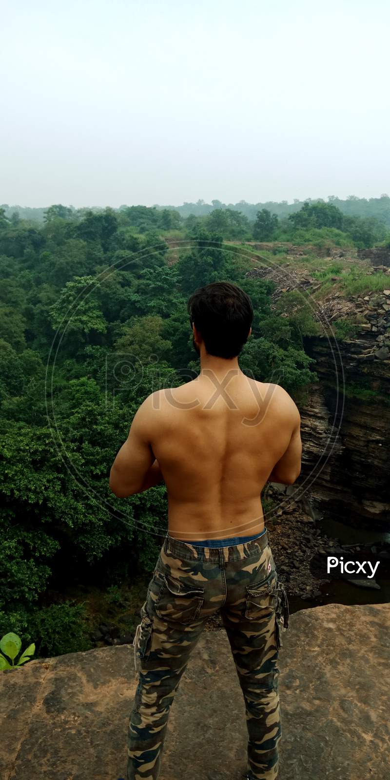 Image of Indian Bodybuilder On Natural Background.-FW030190-Picxy