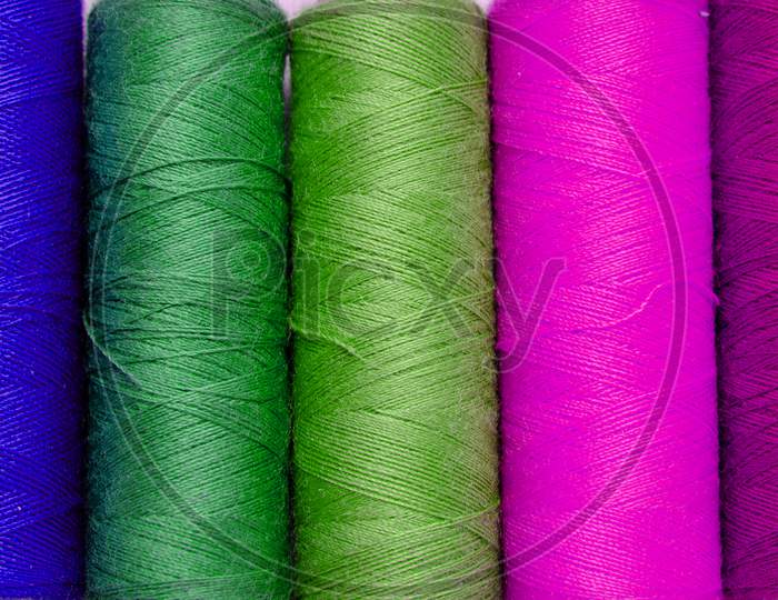 Multicolor Sewing Thread Roll Background