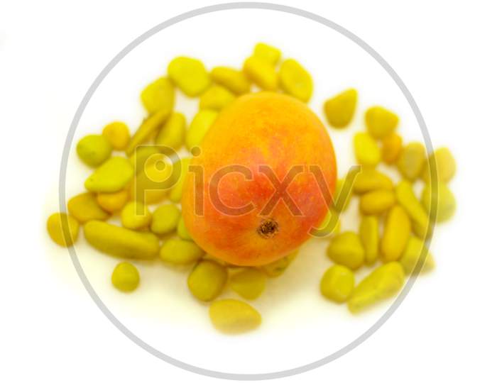 A Yellow Asian Alphanso Mango On White Background
