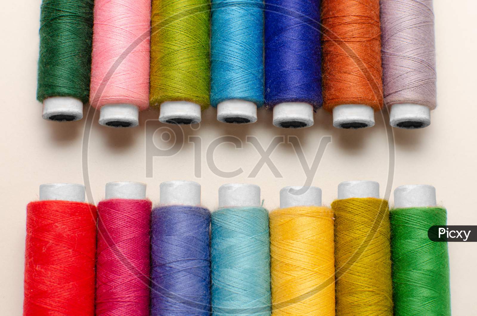 Multi color Sewing Thread Roll Background