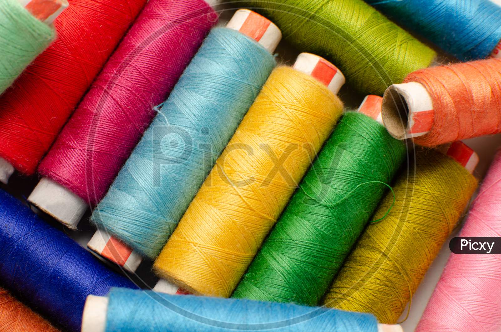 Multicolor Sewing Thread Roll Background