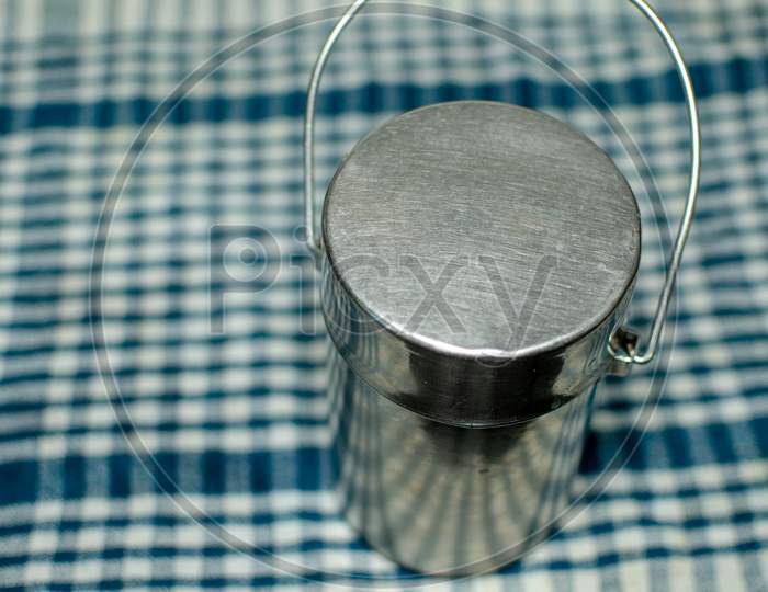 Stainless Steel Container Kept Of Cloth
