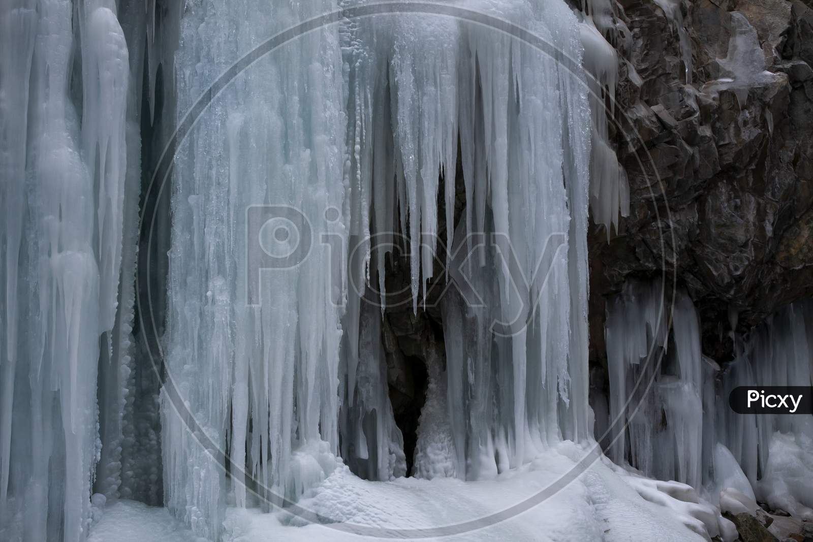 A High Altitude Frozen Water Fall With Several Patterns Of Icicles In Ladakh In India