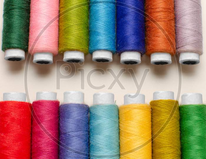 Multi color Sewing Thread Roll Background