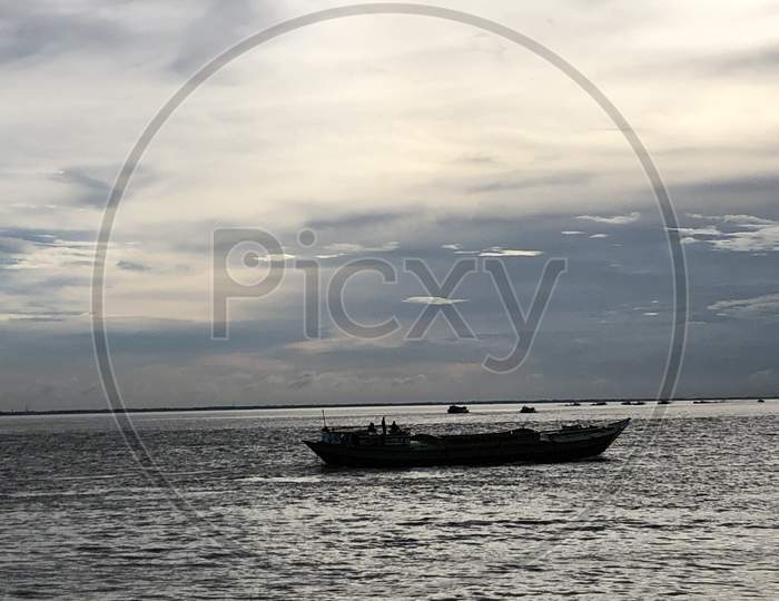 Boat in the calm water photo