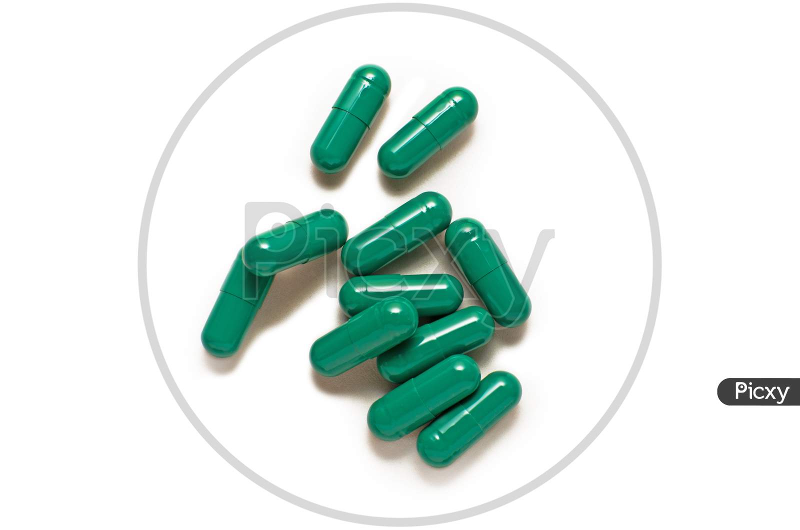 Green Capsule Pills Isolated On White Background