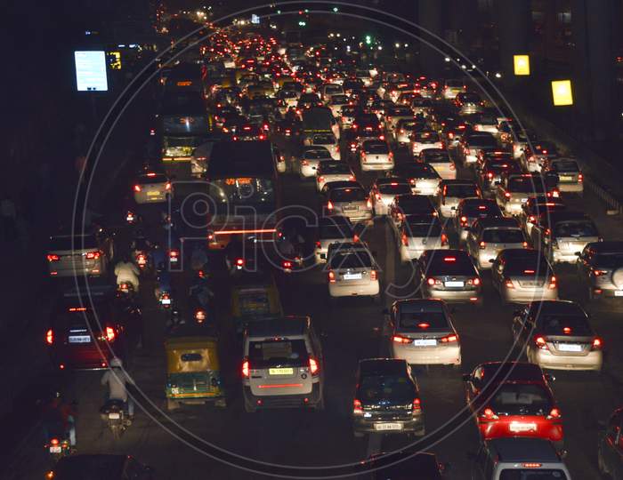 A View Of Traffic Jam At Night From The Rooftop Of Bridge.