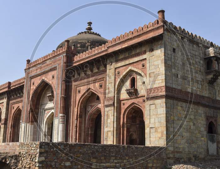 A Mesmerizing View Of Architecture Of Main Tomb At Old Fort From Side Lawn.