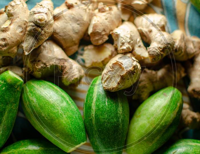 Indian Green Vegetables And Ginger Kept On Cloth