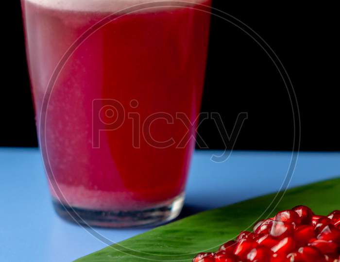 Colorful Pomegranate Fruits And Juice