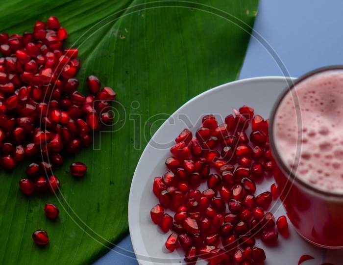 Colorful Pomegranate Fruits And Juice