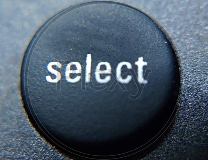 Select button on a TV remote