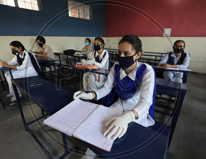 Students attend their school in Jammu on 21 September,2020. The schools across Jammu region partially reopened for 9th to 12th classes after six months closure due to the outbreak of Coronavirus pandemic.