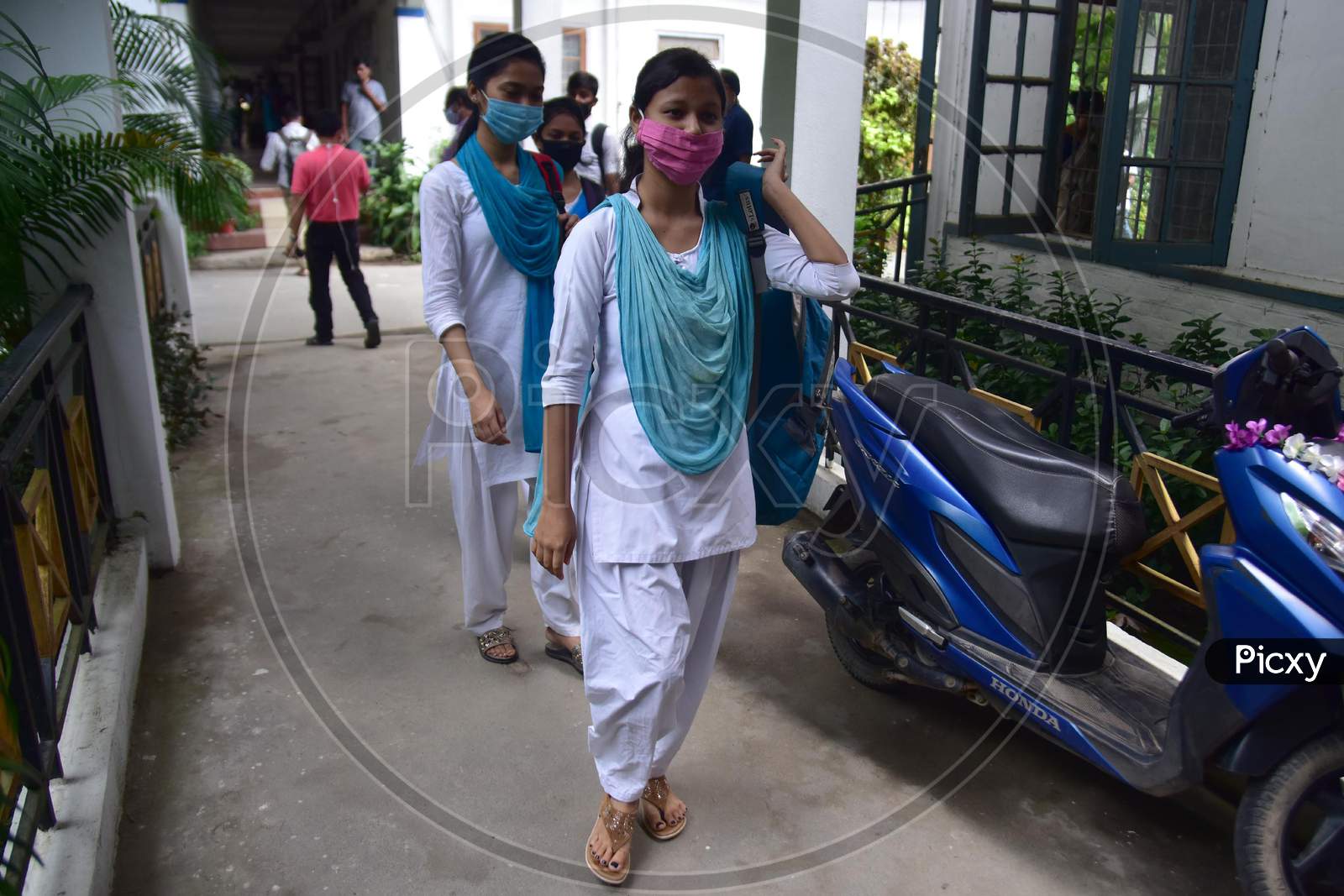 College Students Arrives To Attend Classes  After Schools And Colleges Reopened After More Than 5-Months Closure Due To The Covid-19 Coronavirus Pandemic In  Nagaon District Of Assam on sep 21,2020