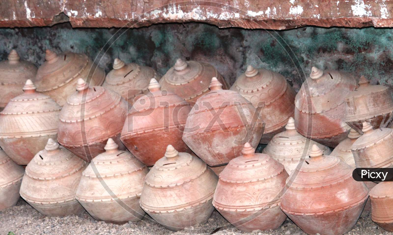 handmade clay piggie banks - gullak
