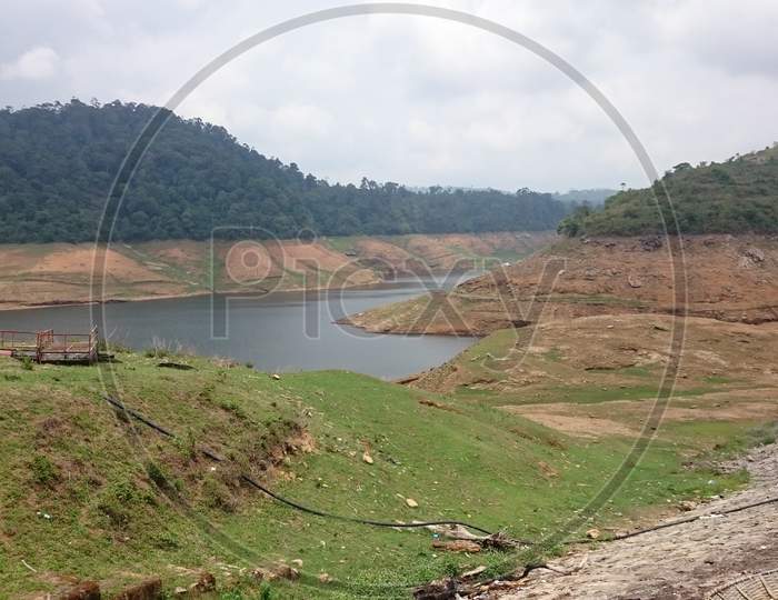 Sholayar Dam Reservoir In Dried Out Condition In Tamilnadu India