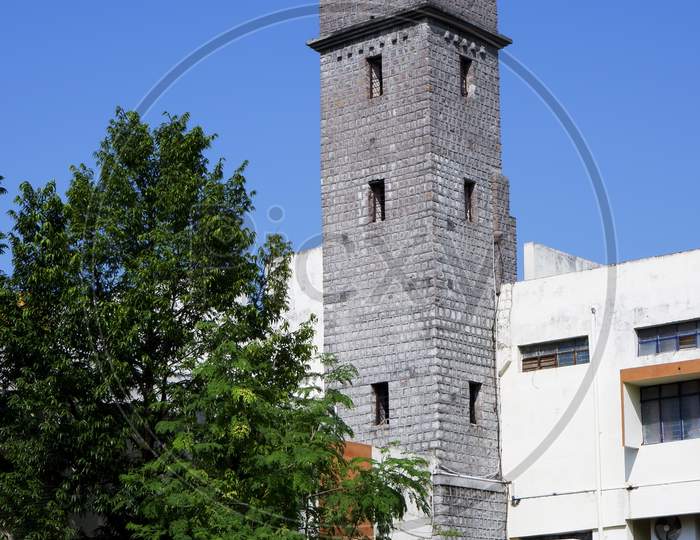 Gulbarga University Library Clock Tower Isolated In Blue Sky