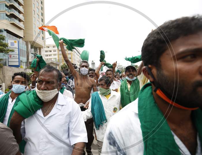Farmers protest against the passage of two controversial farm bills by the country’s parliament in Bangalore, India.