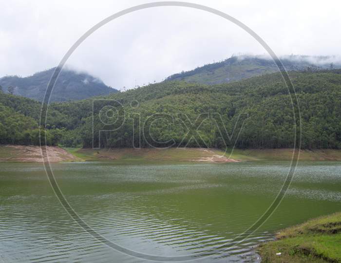 Kundala Lake In Munnar Which Is Formed By The Three Rivers Namely Nallathani Kundala And Periyar In Kerala India