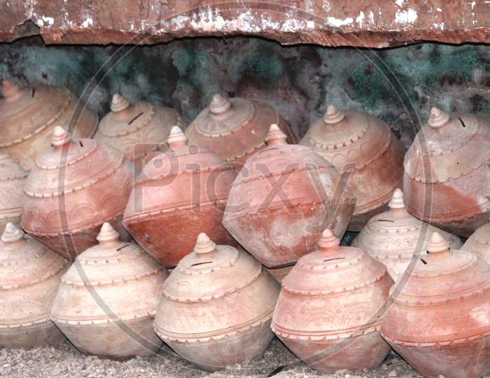 handmade clay piggie banks - gullak