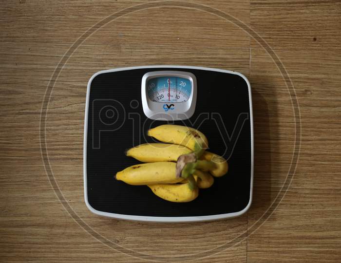 Weight Machine Concept, Banana On The Weight Machine