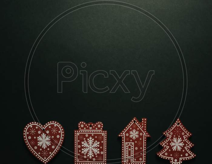 Christmas Flat Lay With Different Symbols Over A Dark Background With Copy Space
