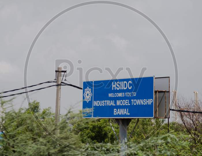 Hsiidc Haryana State Industrial And Infrastructure Development Corporation Blue Board Placed At A Rural Area In Bawal Haryana India Asia