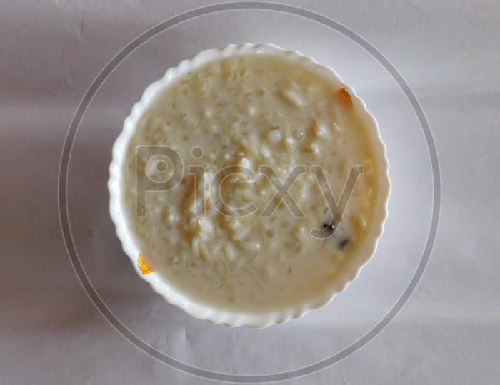 Closeup Of Delicious Dish (Payasam) In A Bowl Isolated On White Surface
