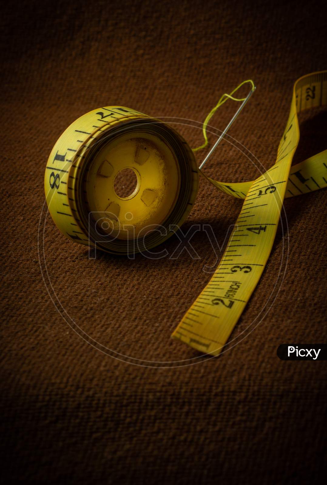 Tailoring Tape On A Brown Background