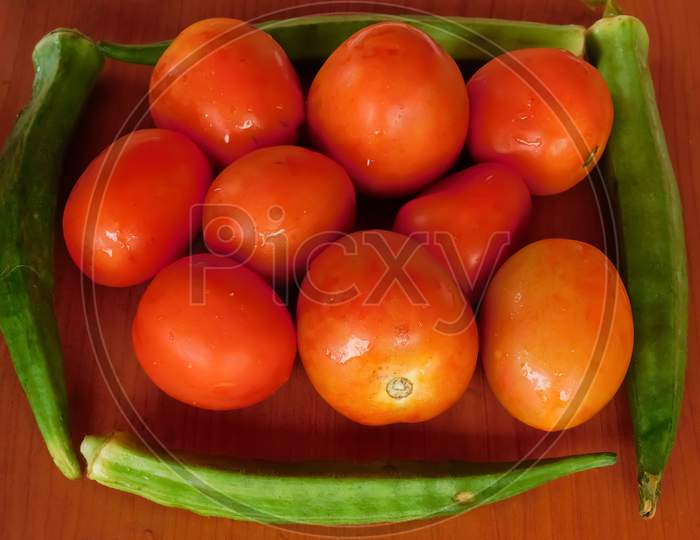 Closeup View Of Vegetables Isolated On A Wooden Surface