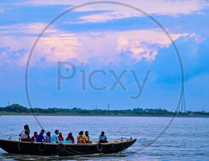 People watching varanasi ghats with boat
