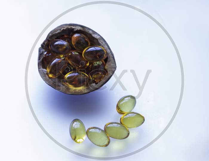 Shell & Capsules Arranged In Curve