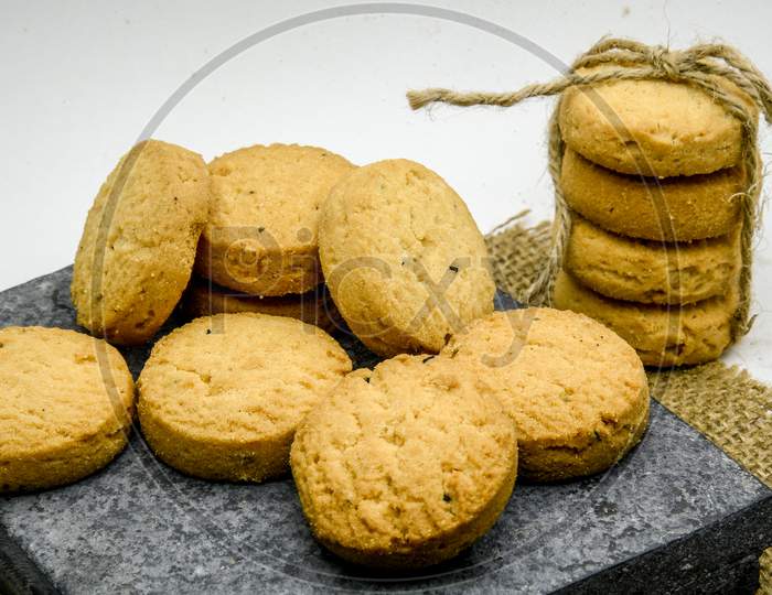 biscuits isolated on dark background.Atta biscuit, cookies, white flour biscuit - Indian cooking