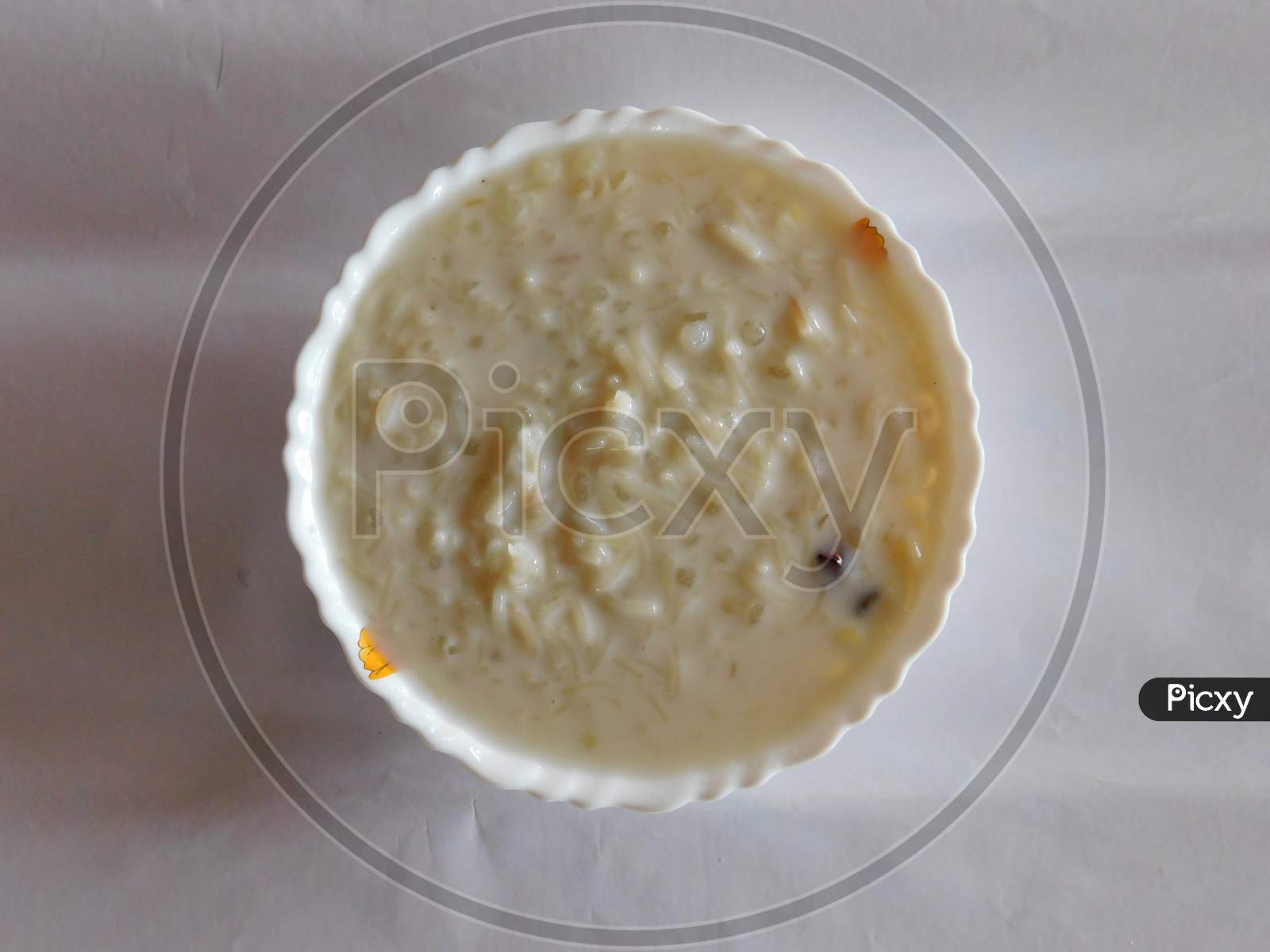 Closeup Of Delicious Dish (Payasam) In A Bowl Isolated On White Surface