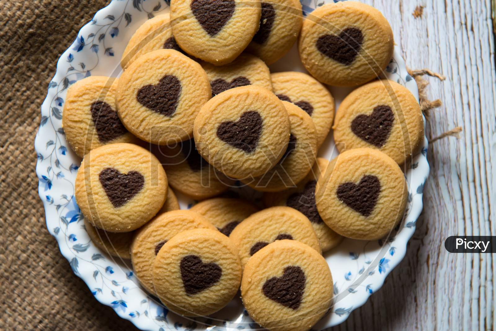 View from top of heart shaped cookies on a plate