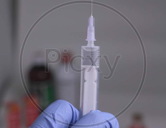 Close-up of medical injection syringe with drug