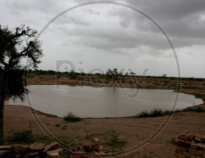 a pond waiting for monsoon, landscape