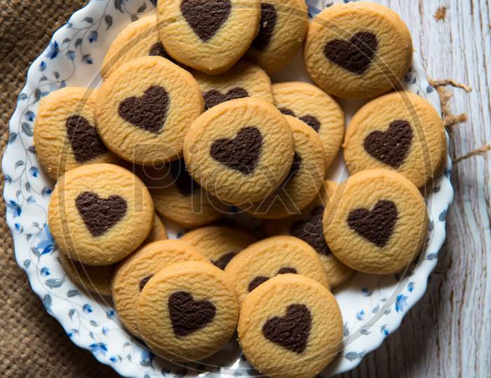 View from top of heart shaped cookies on a plate