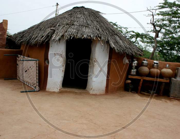 clean village hut, rajasthan