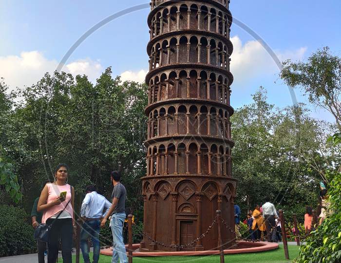 miniature Leaning Tower of Pisa made of waste material in waste to wonder park Delhi Nizamuddin India