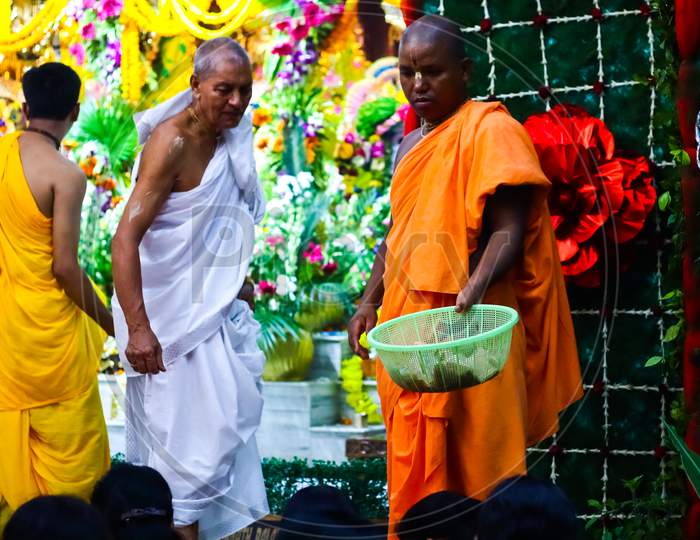 August 15Th, 2020, Iskon Temple, Krishnanagar, Nadia West Bengal. Monks Collect Offerings From Devotees In A Basket After Evening Puja At Krishna Temple, Iskon.