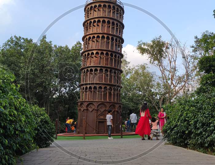 miniature Leaning Tower of Pisa made of waste material in waste to wonder park Delhi Nizamuddin India