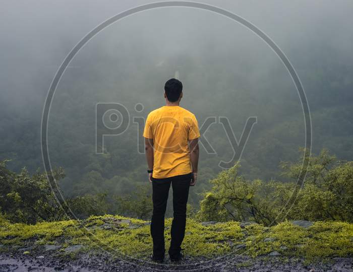 Man standing in the fog