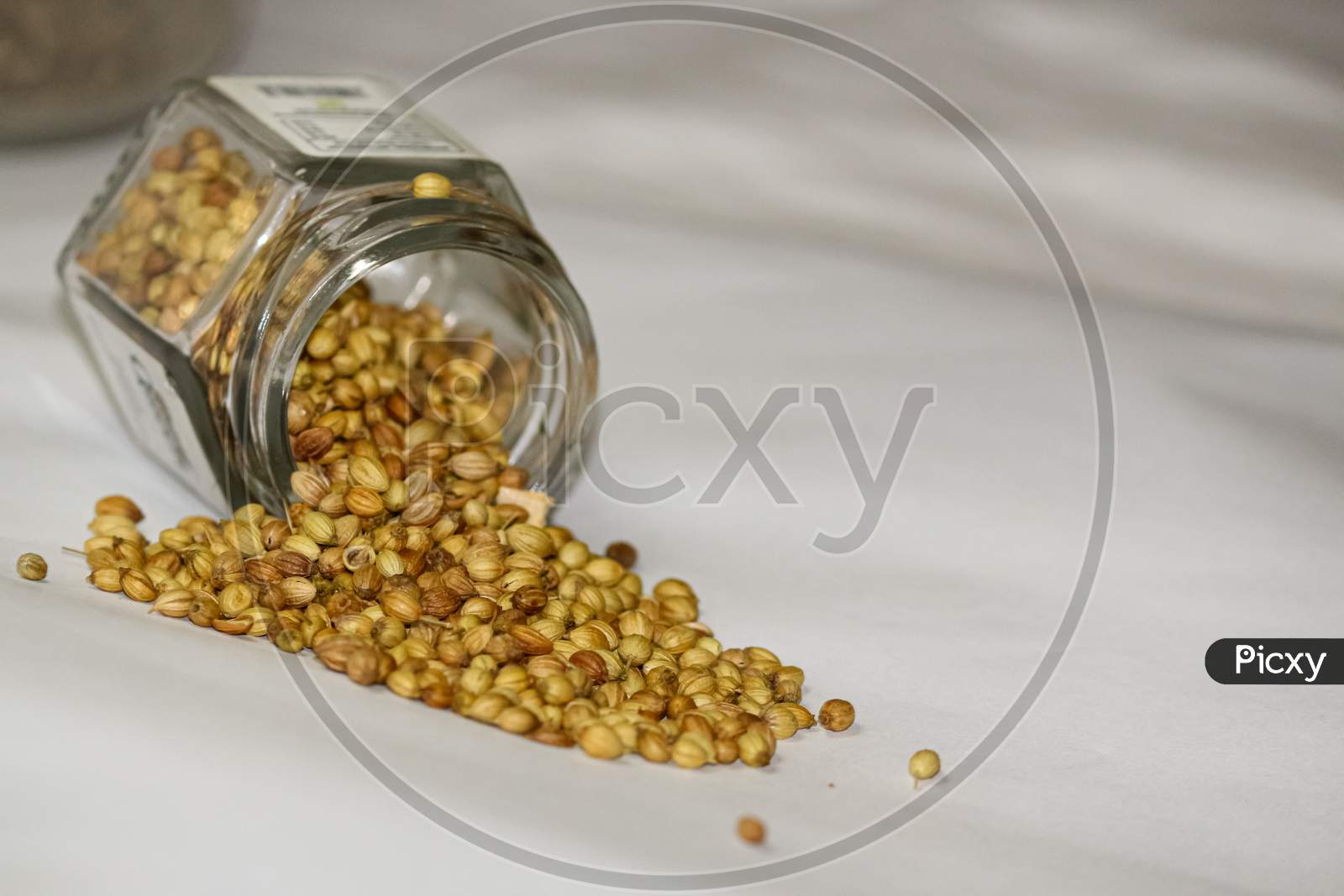 coriander seeds in a glass jar