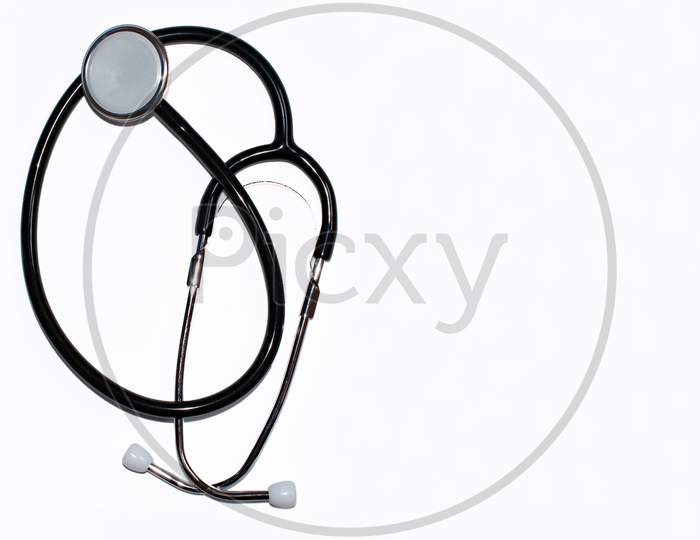 Modern black stethoscope isolated on white background